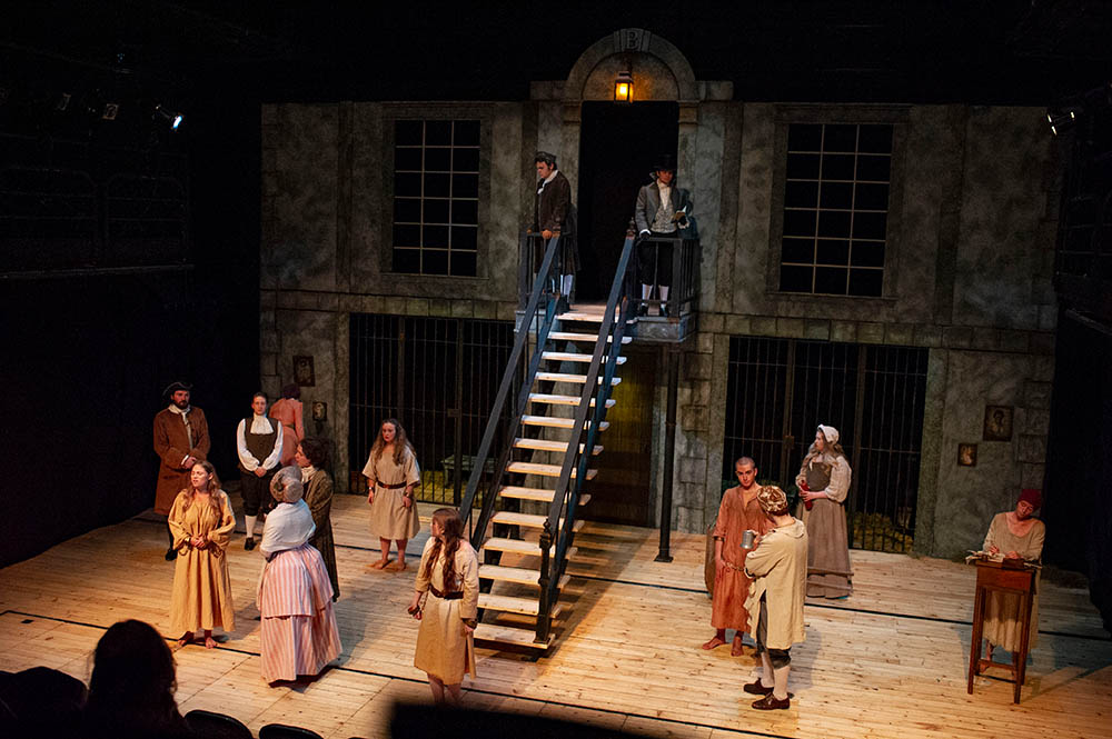 Production full set, prison scene with 12 actors